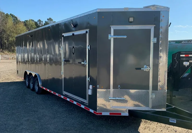 Black Manley triple-axle trailer